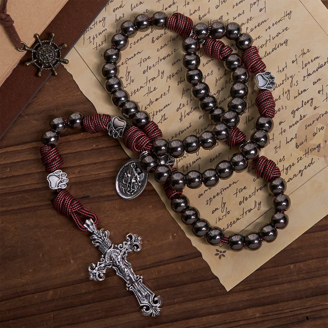 Christianartworkshop Robuster Rosenkranz aus Paracord mit bronzefarbenen Perlen, Pfotenanhängern und St. Michael - St. Michael & Kruzifix - image 0