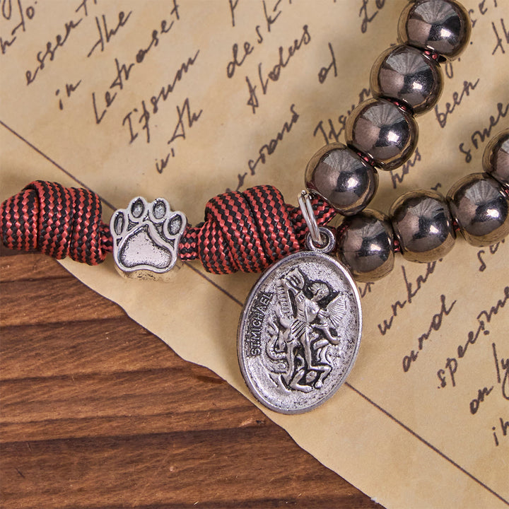 Christianartworkshop Robuster Paracord-Rosenkranz aus metallischen Perlen mit Pfotenanhängern und St. Michael - image 8
