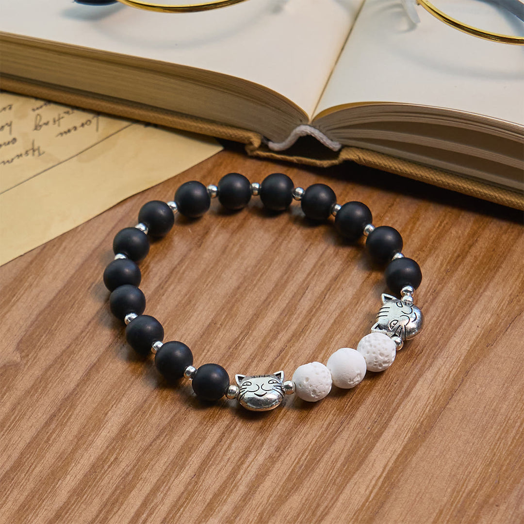 Christianartworkshop Mattschwarzer und weißer Lavastein mit Katzen- und Kuh-Chrams-Armband und Tier-Rosenkranz - image 13