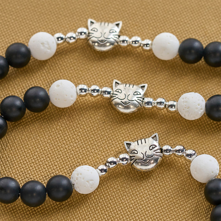 Christianartworkshop Mattschwarzer und weißer Lavastein mit Katzen- und Kuh-Chrams-Armband und Tier-Rosenkranz - image 9