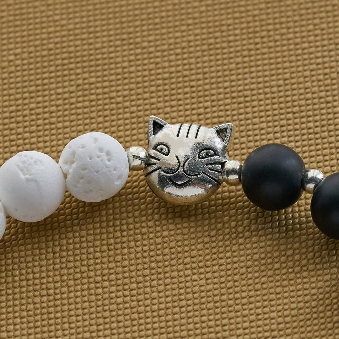 Christianartworkshop Mattschwarzer und weißer Lavastein mit Katzen- und Kuh-Chrams-Armband und Tier-Rosenkranz - image 15