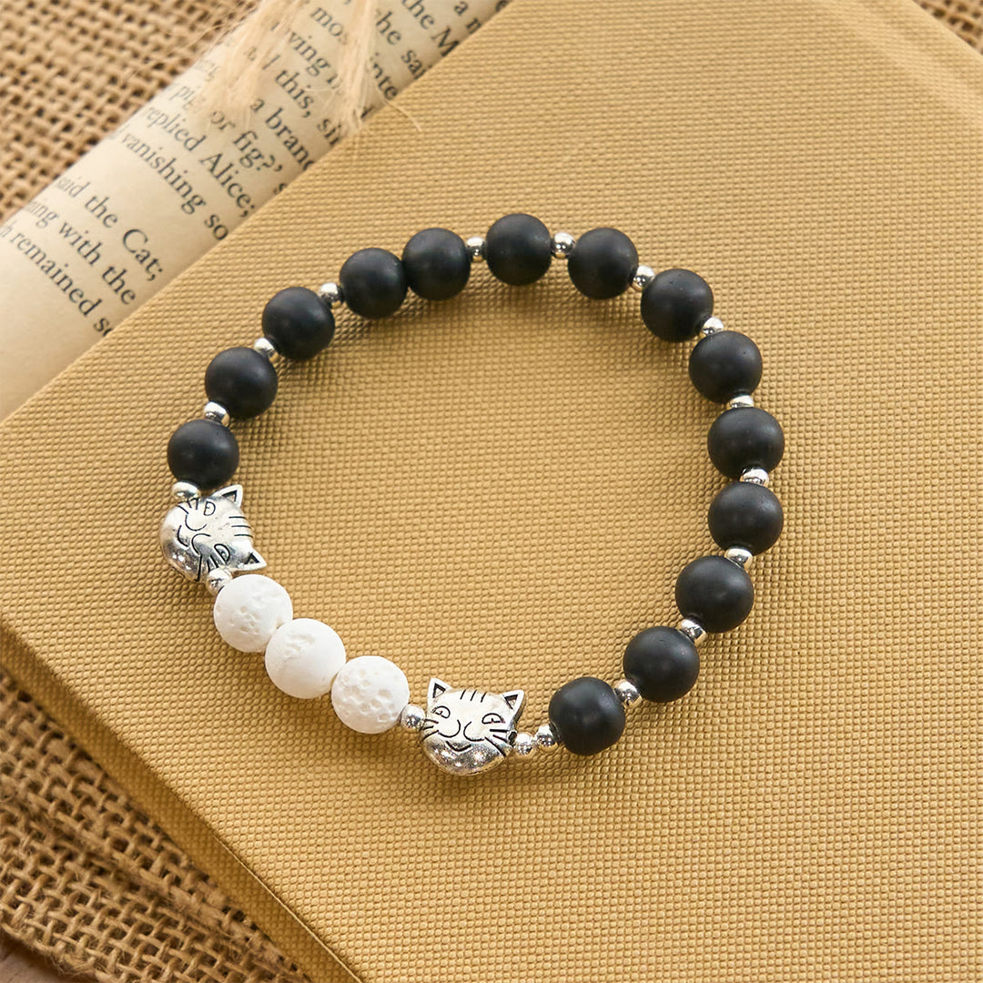 Christianartworkshop Mattschwarzer und weißer Lavastein mit Katzen- und Kuh-Chrams-Armband und Tier-Rosenkranz - image 12
