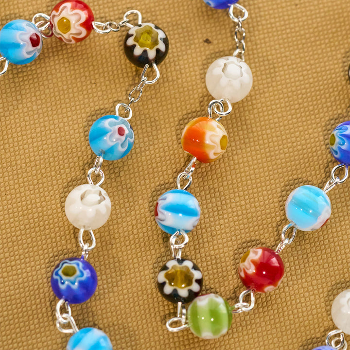 Christianartworkshop Rosenkranz aus Murano-Perlen mit buntem, lebendigem Blumenmuster und Madonna und Kind - image 7