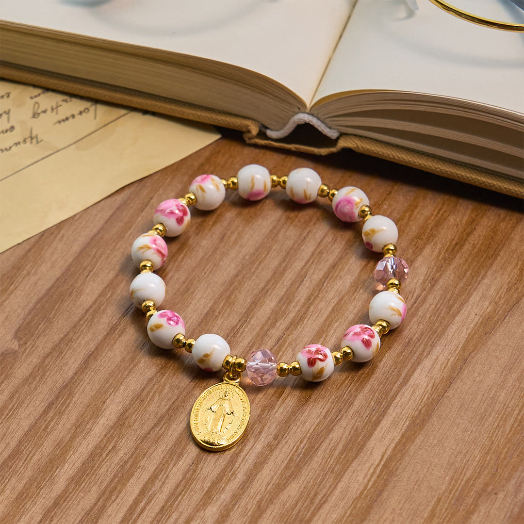 Christianartworkshop Elegantes 8 mm großes Armband aus rosa Keramik mit Blumenmuster und Wundertätiger Medaille - Rosa Keramikarmband - image 1