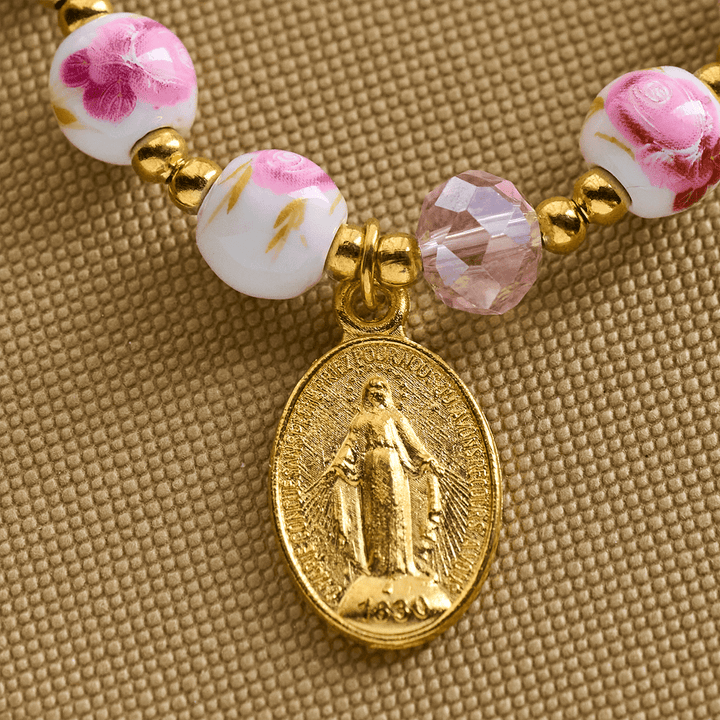 Christianartworkshop Elegantes 8 mm großes Armband aus rosa Keramik mit Blumenmuster und Wundertätiger Medaille - image 4