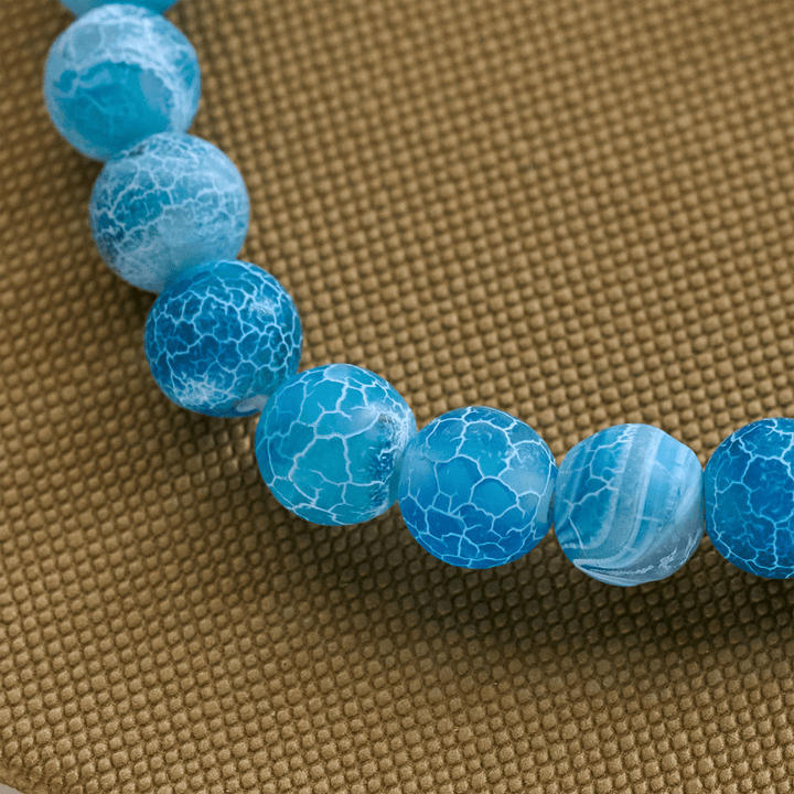 Christianartworkshop Waves of Grace Hai-Schutzkreuz-Armband mit natürlichen Vulkanachat-Steinen - image 4