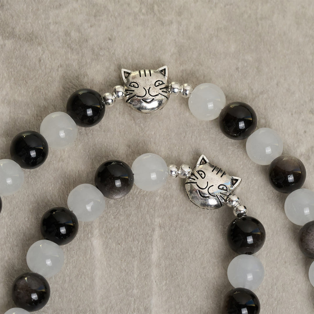 Christianartworkshop Segen Unserer Lieben Frau mit schwarz-weißen Kuh- und Katzenperlen-Armband, Tier-Rosenkranz - image 7