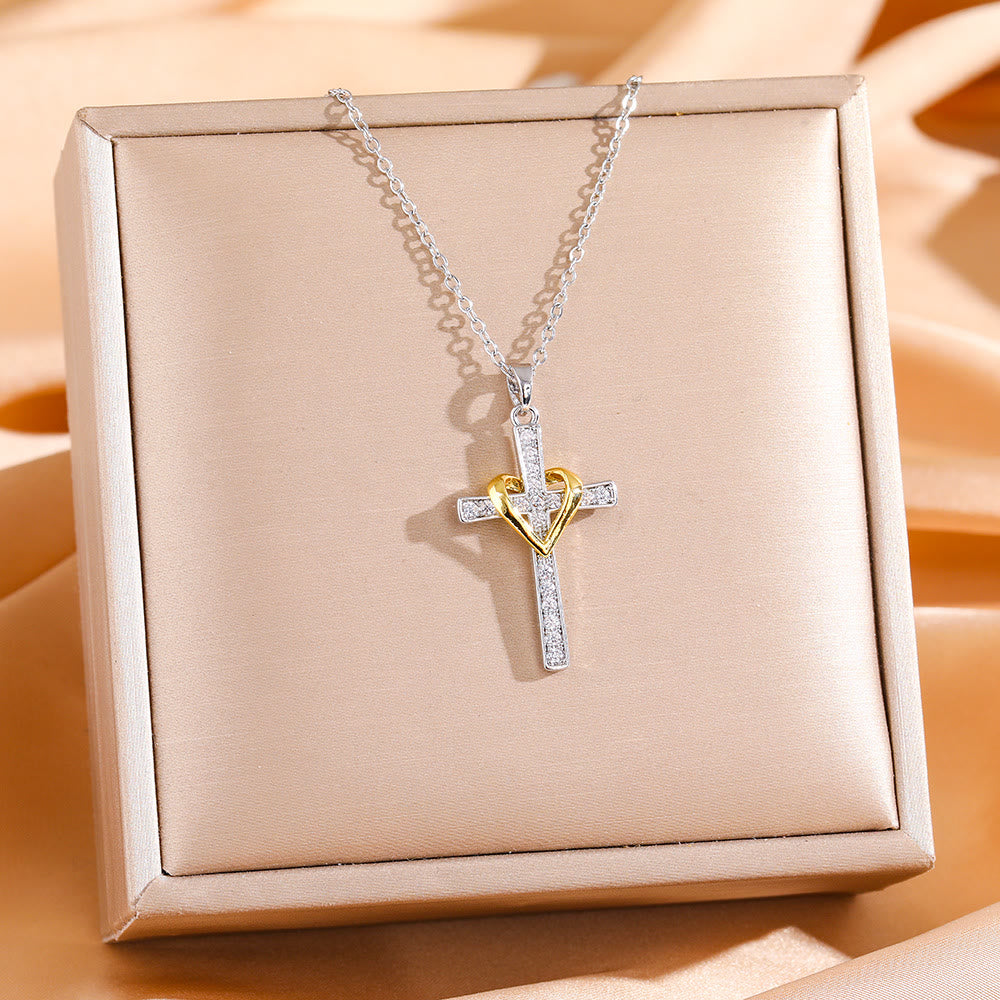 Christianartworkshop Zweifarbige Herz- und Kreuzkette mit Zirkonen: Verschmelzung von Liebe und Glauben - Silbernes Kreuz mit goldenem Herz - image 4