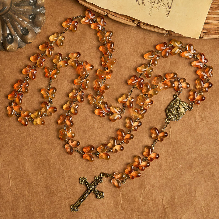 Christianartworkshop Erntedankfest: Bernsteinfarbene Schmetterlingsperlen mit Kruzifix und Tierrosenkranz der Heiligen Familie - image 5