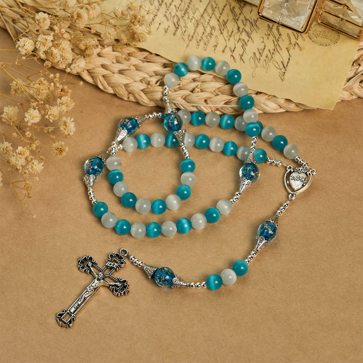 Christianartworkshop Glitzernder Rosenkranz aus Katzenaugenstein und blauem Sternglas mit Heiligem Herzen - image 3