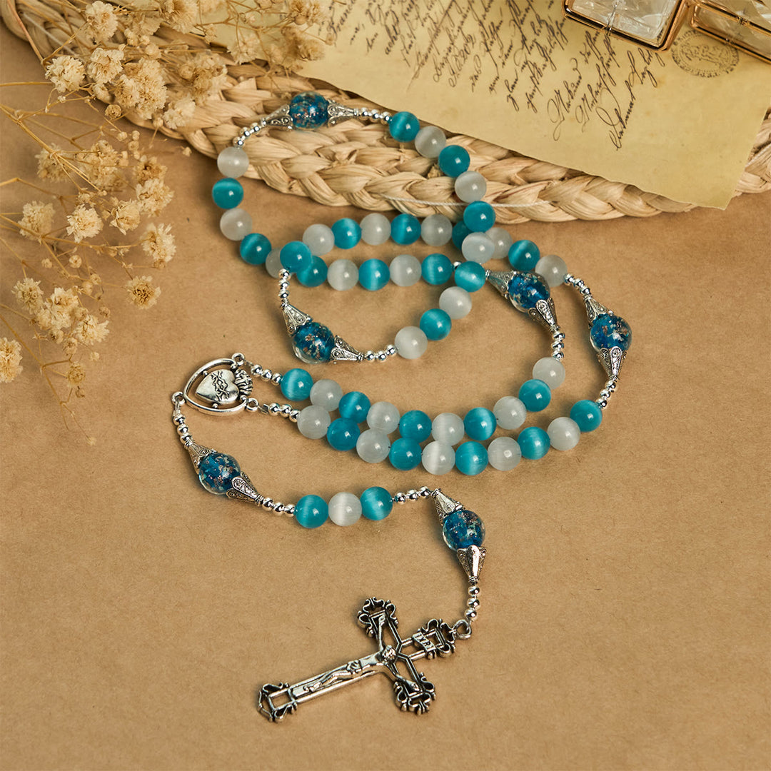 Christianartworkshop Glitzernder Rosenkranz aus Katzenaugenstein und blauem Sternglas mit Heiligem Herzen - image 4