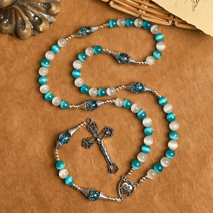 Christianartworkshop Glitzernder Rosenkranz aus Katzenaugenstein und blauem Sternglas mit Heiligem Herzen - image 2
