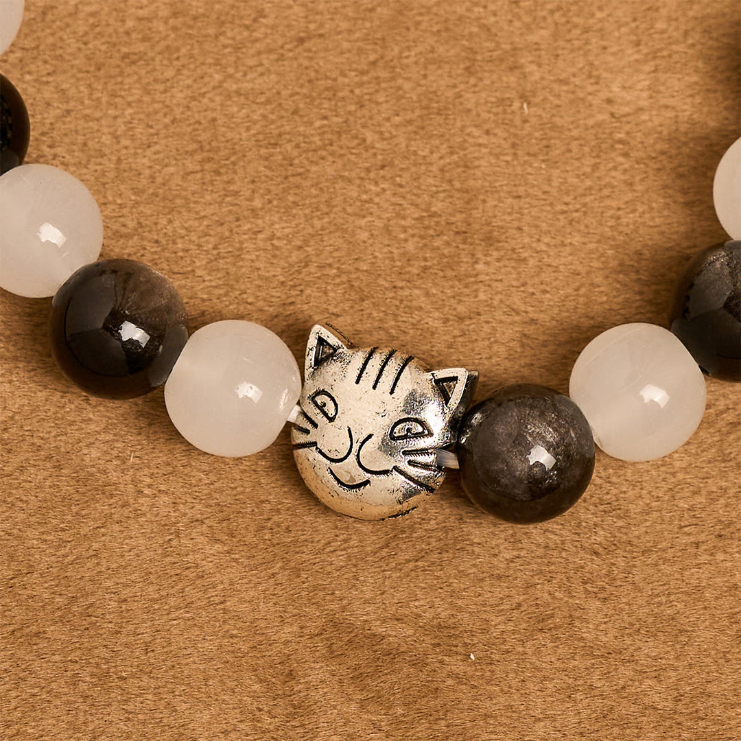 Christianartworkshop Segen Unserer Lieben Frau mit schwarz-weißen Kuh- und Katzenperlen, Tierarmband - image 7