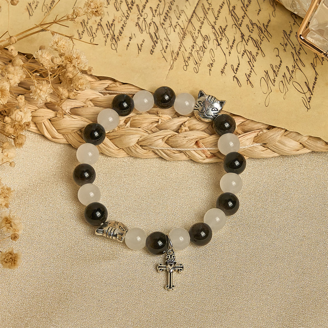 Christianartworkshop Segen Unserer Lieben Frau mit schwarz-weißen Kuh- und Katzenperlen, Tierarmband - image 2