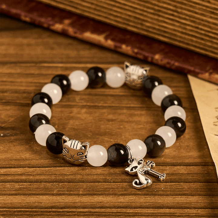 Christianartworkshop Segen Unserer Lieben Frau mit schwarz-weißen Kuh- und Katzenperlen-Armband, Tier-Rosenkranz - image 15