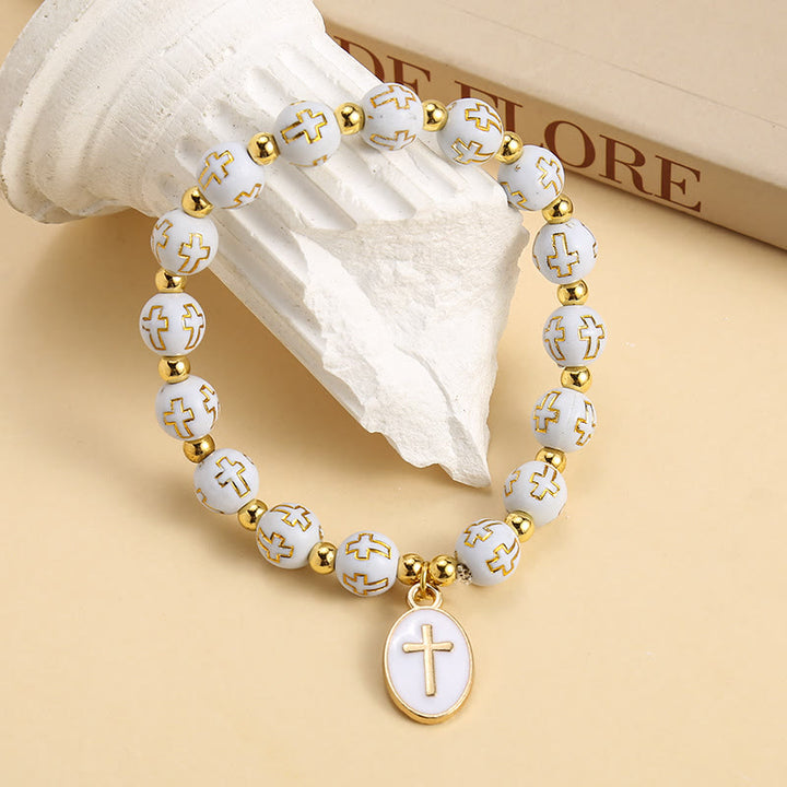 Christianartworkshop Elegantes, schlichtes weißes und goldenes Kreuzperlenarmband: Reine Anmut für jeden Tag - image 3
