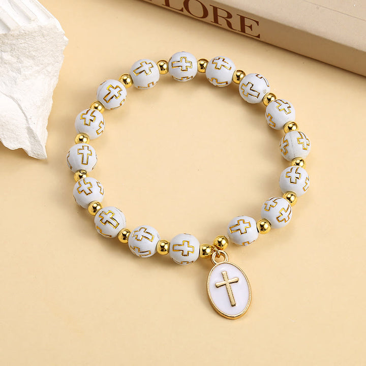 Christianartworkshop Elegantes, schlichtes weißes und goldenes Kreuzperlenarmband: Reine Anmut für jeden Tag - image 4
