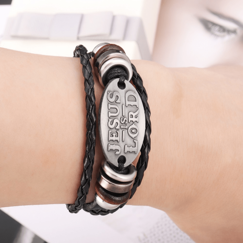 Schwarzes geflochtenes Lederarmband von Christianartworkshop mit der Inschrift „JESUS ​​IST HERR“. - image 1