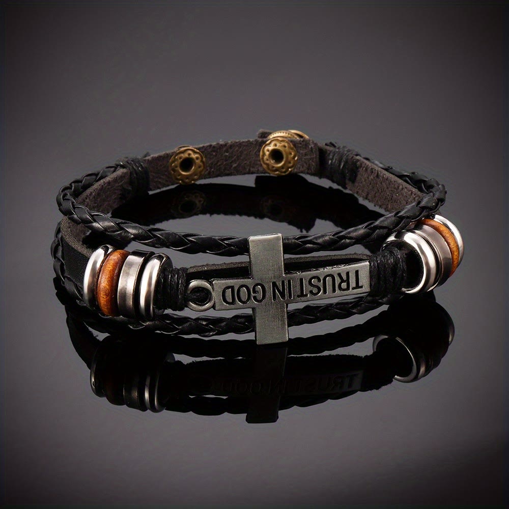 Schwarzes geflochtenes Lederarmband von Christianartworkshop mit Kreuz und der Inschrift „Vertraue auf Gott“. - image 2