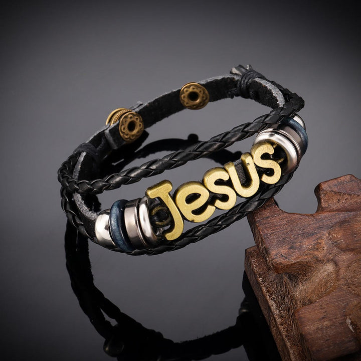 Christianartworkshop Zweifarbiges Jesus-Charm-Armband auf schwarzem geflochtenem Leder - Bronze - image 0