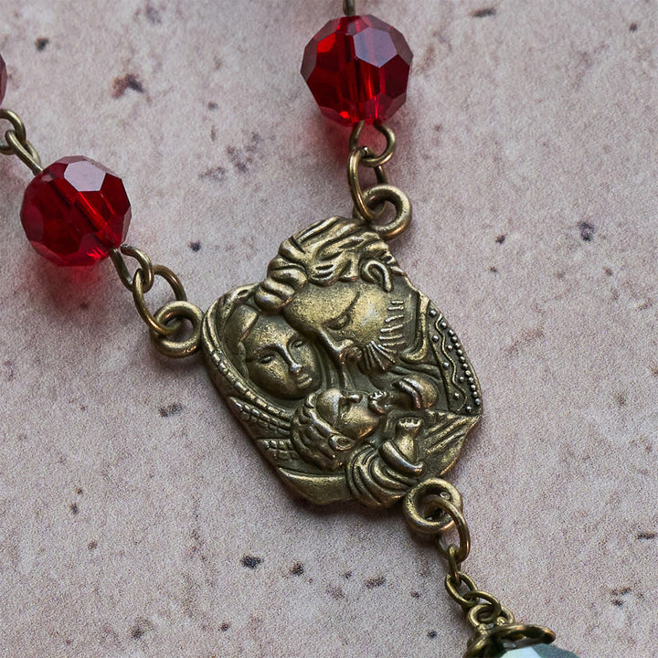 Christliche Kunstwerkstatt: Rosenkranz der Geburt Christi mit roten und grünen Perlen: Geführt von der Heiligen Familie - image 8