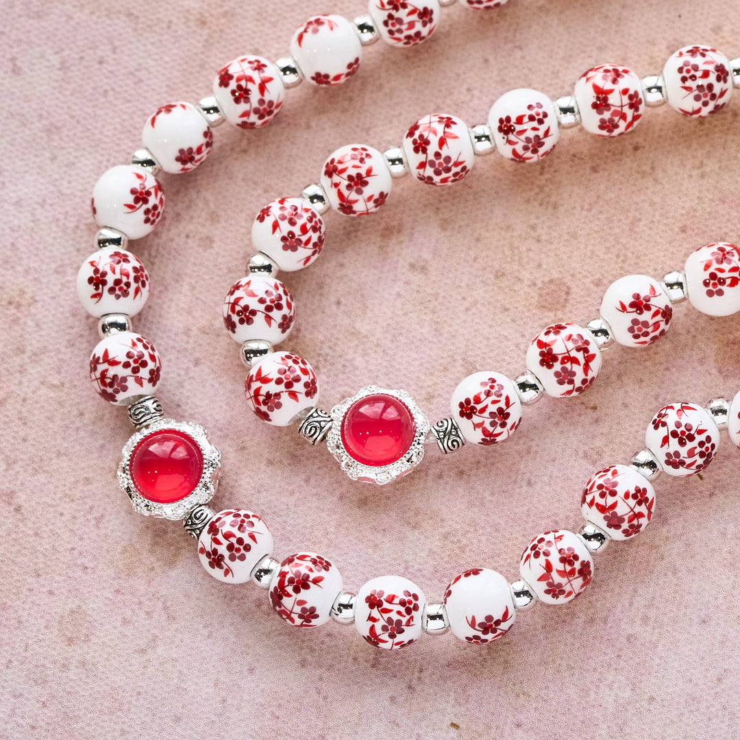 Christianartworkshop Rosenkranz aus floralem Porzellan und Katzenauge: Andacht im Detail und Gebetsverbindung - image 2