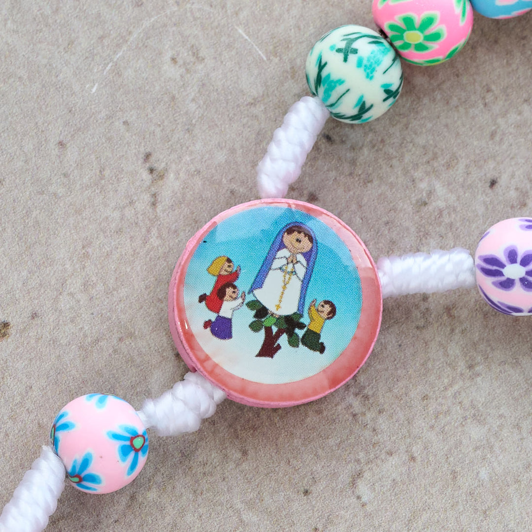 Christianartworkshop Rosenkranz und Armband für Kinder in Blau und Rosa: Bunte Perlen und heilige Symbole für junge Herzen - image 7