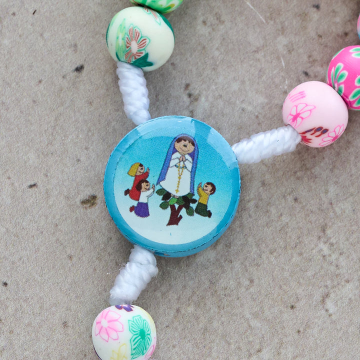 Christianartworkshop Rosenkranz und Armband für Kinder in Blau und Rosa: Bunte Perlen und heilige Symbole für junge Herzen - image 4