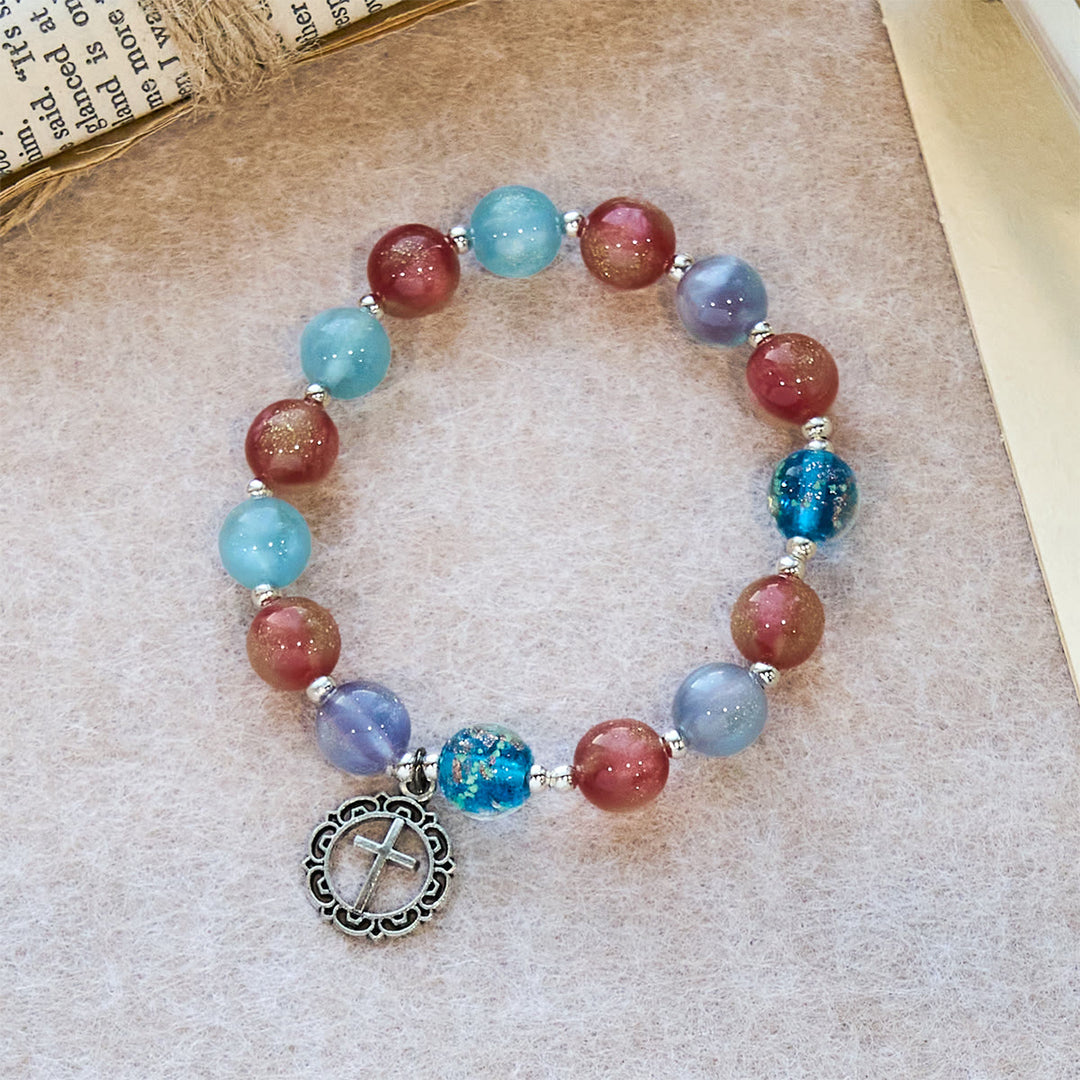 Christianartworkshop UV-wechselndes Glitzerperlenarmband mit verziertem Kreuz: Schimmert in leuchtenden Farben - image 3