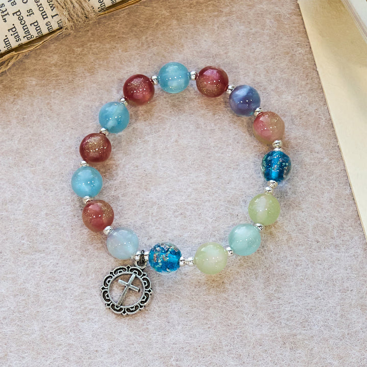 Christianartworkshop UV-wechselndes Glitzerperlenarmband mit verziertem Kreuz: Schimmert in leuchtenden Farben - Handgelenkumfang: 7,87 Zoll/20 cm (verstellbar) - image 0