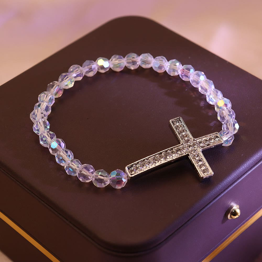 Christianartworkshop Armband mit weißem und pfauenblauem Kreuz: Glaube in Schimmer gehüllt - image 2