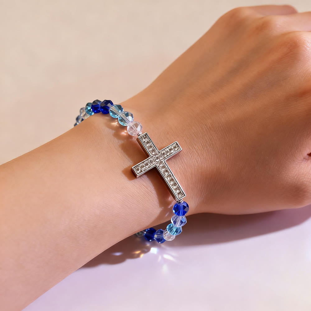 Christianartworkshop Armband mit weißem und pfauenblauem Kreuz: Glaube in Schimmer gehüllt - image 7