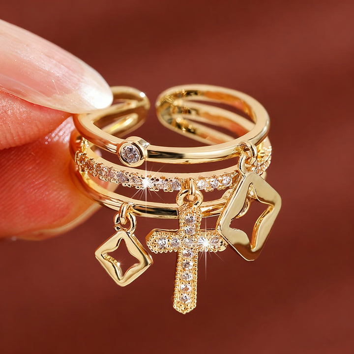 Christianartworkshop Schimmernder Ring mit Kreuzanhänger und mehrlagigem Band: Erinnert an seinen stillen Frieden - Golden (Geeignet für US-Größen 6-11) - image 0