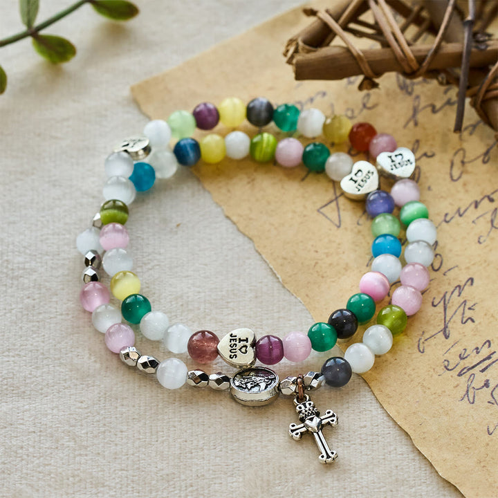 Christianartworkshop Mehrfarbiges Katzenaugen-Perlenarmband (Halskette für Kinder) mit „Ich liebe Jesus“- und Erzengel-Medaillen - image 2