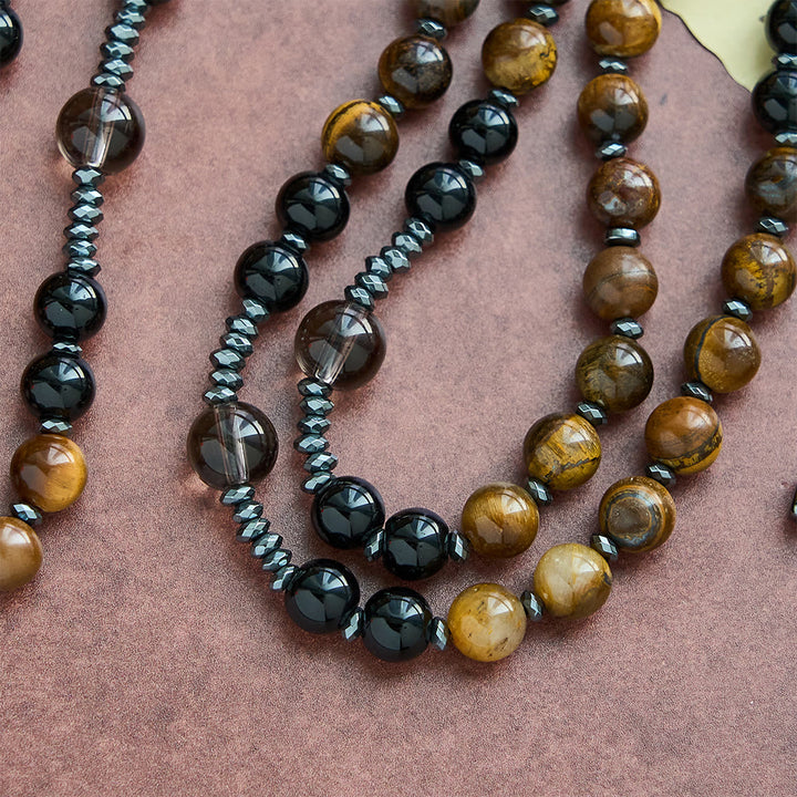 Christianartworkshop aus natürlichem Obsidian mit Tigerauge-Motiv – Rosenkranz aus Hämatit-Stein mit Kreuz zum Schutz - image 3