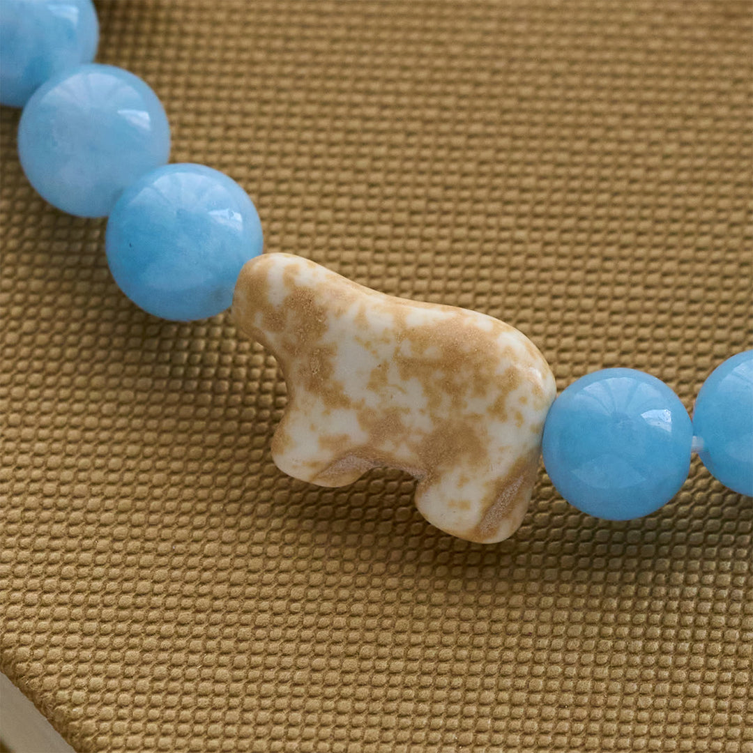 Christianartworkshop Handgefertigtes Armband mit blauem Perlen-Eisbärenkreuz: Rettet unsere Eisbären! - image 4