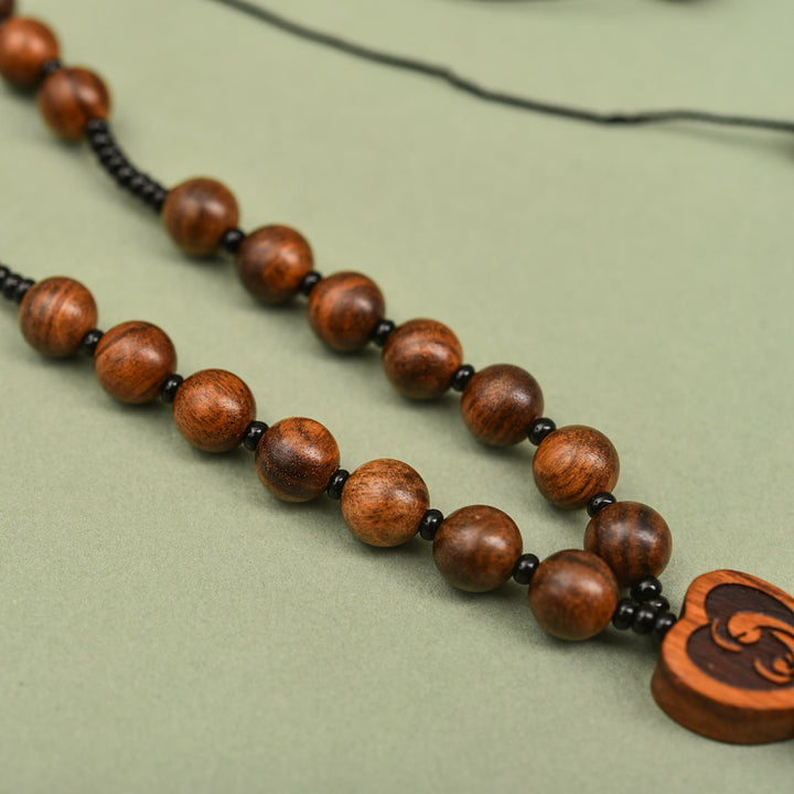 Christianartworkshop Zweifach gestalteter Rosenkranzanhänger aus Holz mit Kruzifix-Motiv: Ein Symbol für den Schutz des Reisenden - image 4