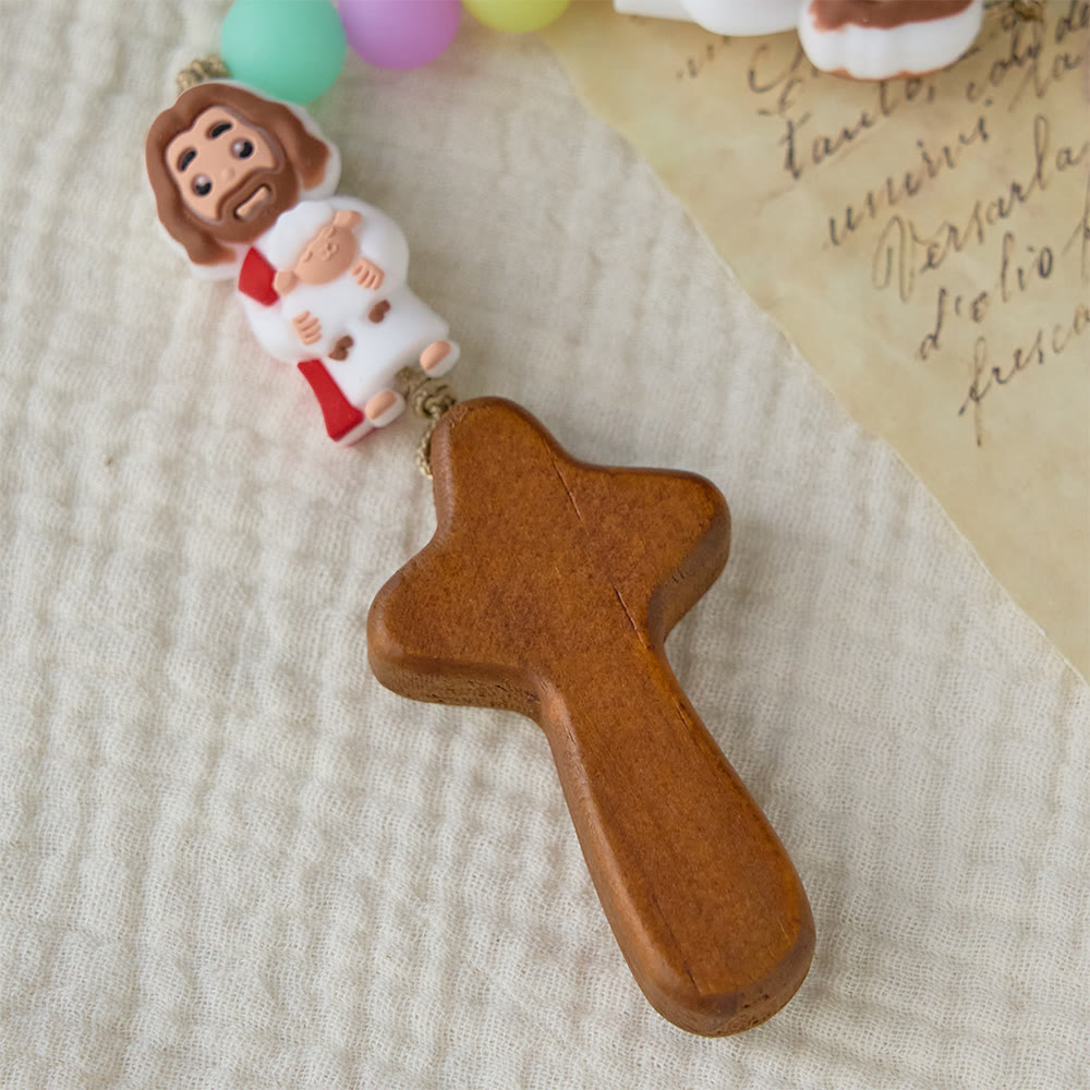 Christianartworkshop Rosenkranz aus pastellfarbenen Silikonperlen mit Jesus-Motiven: Ein Symbol kindlichen Glaubens und göttlicher Freude - image 5