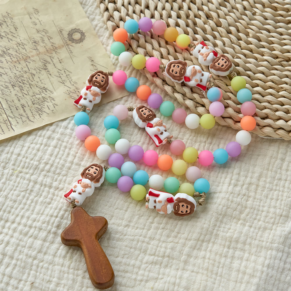 Christianartworkshop Rosenkranz aus pastellfarbenen Silikonperlen mit Jesus-Motiven: Ein Symbol kindlichen Glaubens und göttlicher Freude - Cartoon-Jesus-Akzente Rosenkranz - image 0