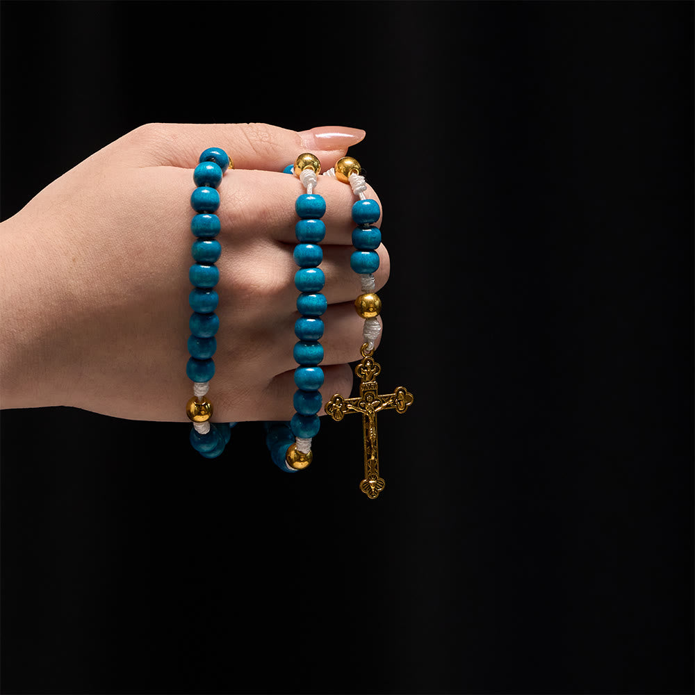 Christianartworkshop Rosenkranz aus blauen Holzperlen mit Marienmedaillon: Ein Symbol der Gnade und des göttlichen Glaubens - image 1