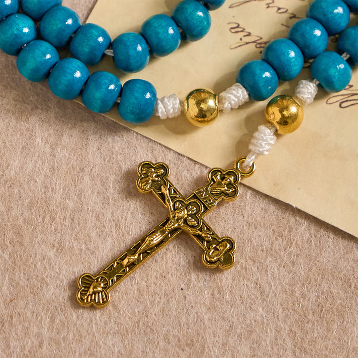 Christianartworkshop Rosenkranz aus blauen Holzperlen mit Marienmedaillon: Ein Symbol der Gnade und des göttlichen Glaubens - image 7