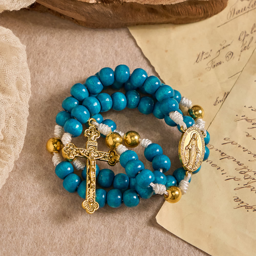 Christianartworkshop Rosenkranz aus blauen Holzperlen mit Marienmedaillon: Ein Symbol der Gnade und des göttlichen Glaubens - image 4