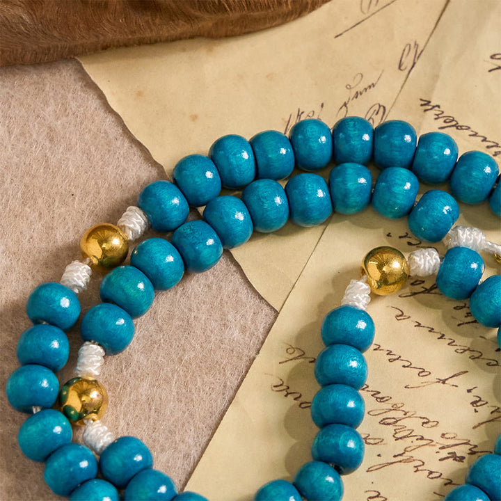 Christianartworkshop Rosenkranz aus blauen Holzperlen mit Marienmedaillon: Ein Symbol der Gnade und des göttlichen Glaubens - image 6