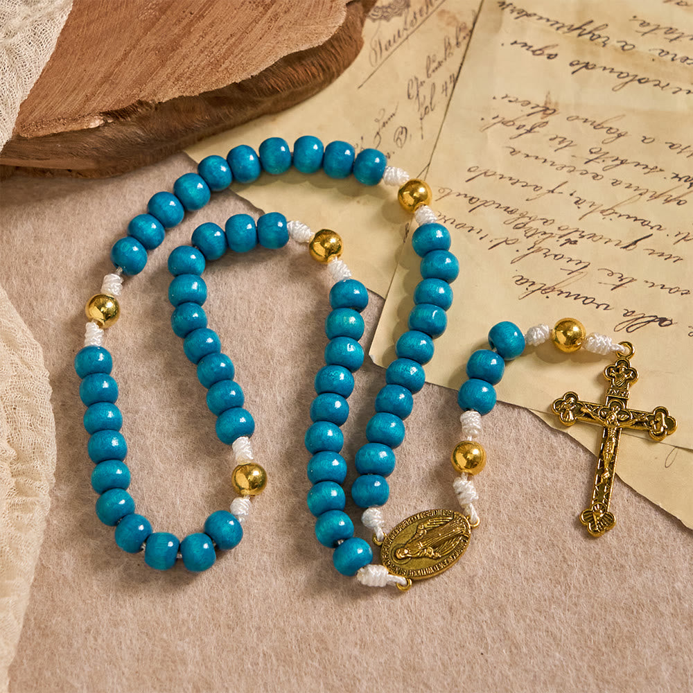 Christianartworkshop Rosenkranz aus blauen Holzperlen mit Marienmedaillon: Ein Symbol der Gnade und des göttlichen Glaubens - Unsere Liebe Frau und das Kruzifix - image 0