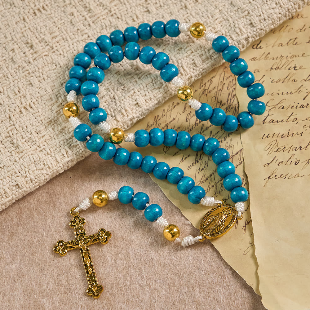 Christianartworkshop Rosenkranz aus blauen Holzperlen mit Marienmedaillon: Ein Symbol der Gnade und des göttlichen Glaubens - image 2