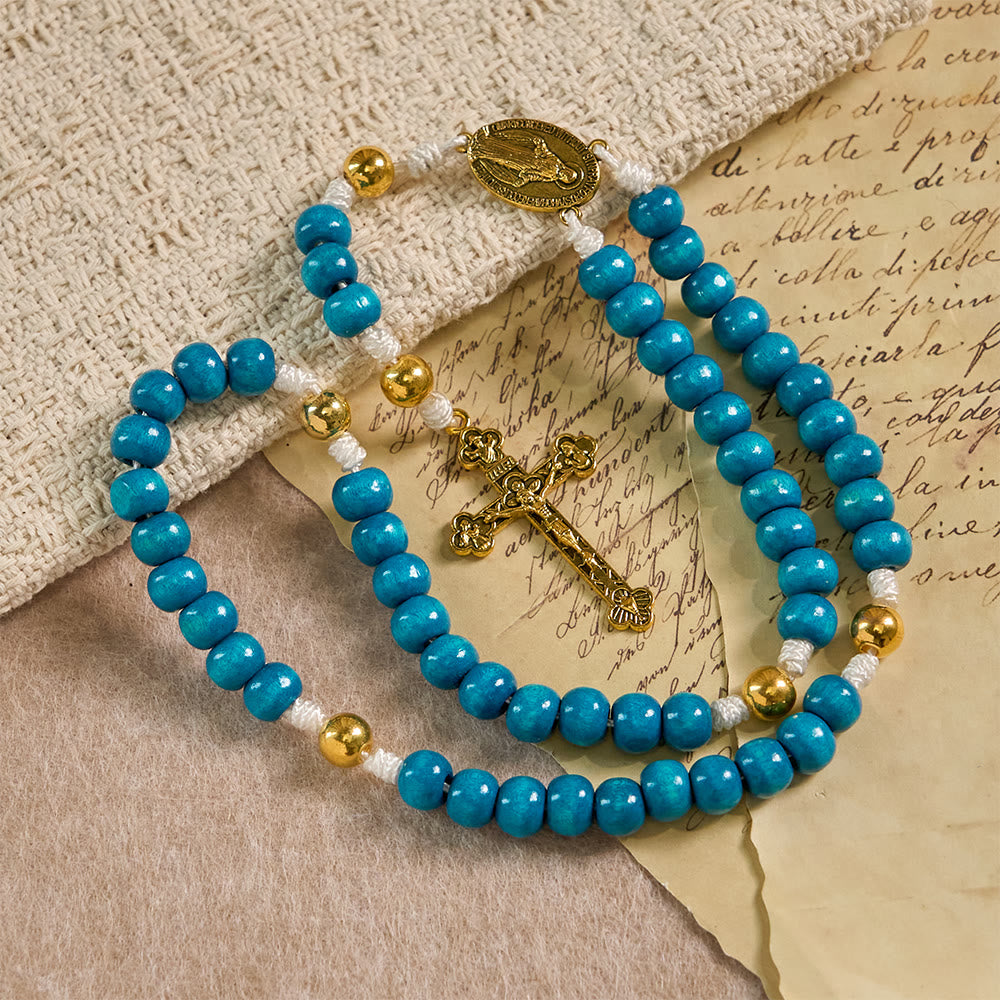 Christianartworkshop Rosenkranz aus blauen Holzperlen mit Marienmedaillon: Ein Symbol der Gnade und des göttlichen Glaubens - image 3