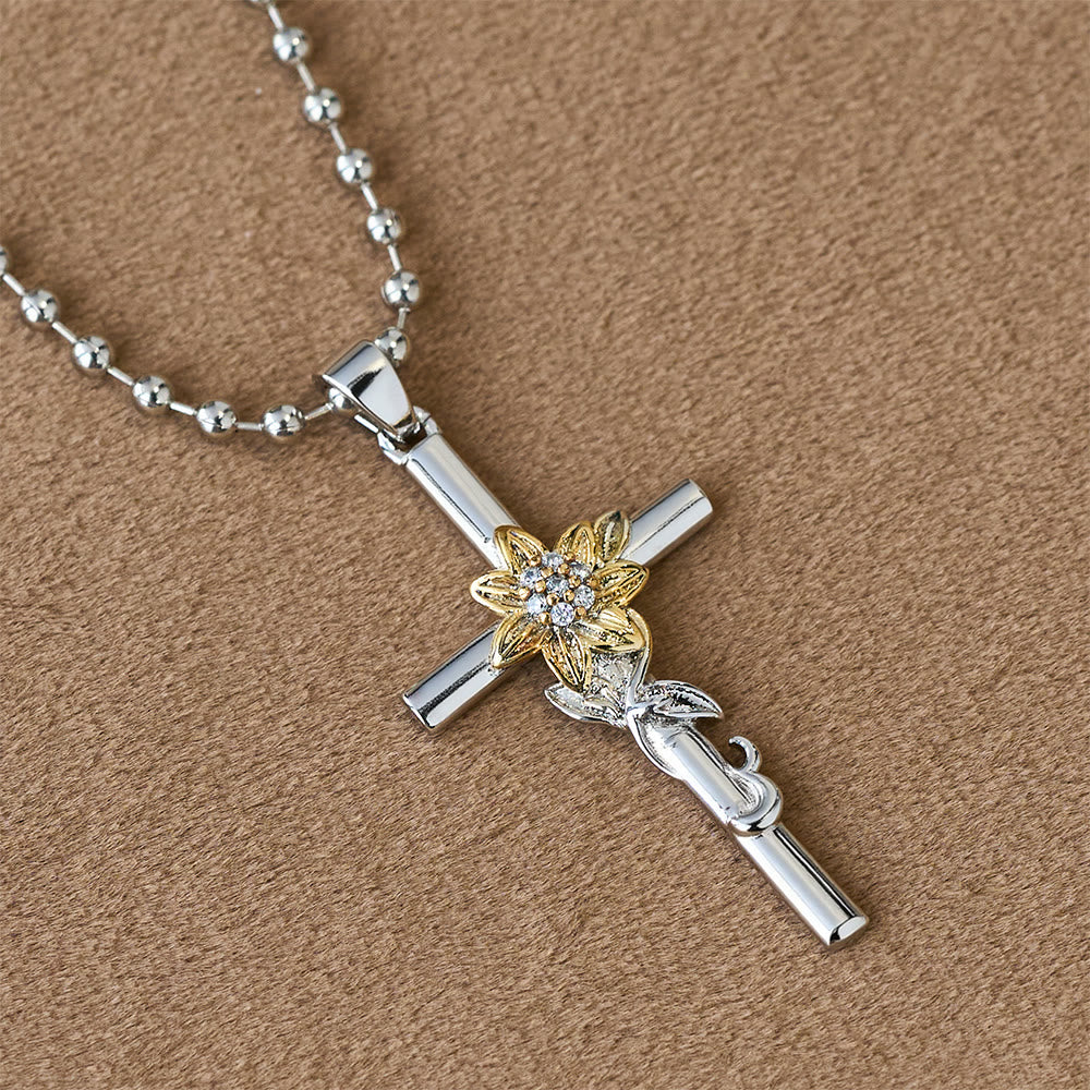 Christianartworkshop Silberfarbene Halskette mit Kreuzanhänger und goldenen Blumen- und Blattdetails - Kreuz und Blume - image 0