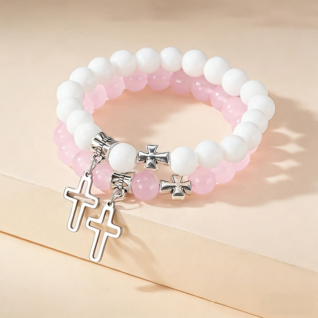 Christianartworkshop Zweifarbiges Armband-Set mit Kreuzanhängern: Ein Symbol des Glaubens für jeden Tag - Rosa + Weiß - image 0