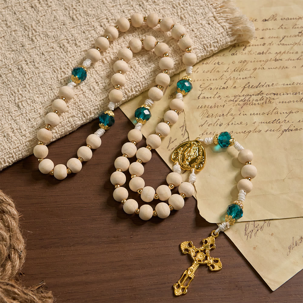 Christianartworkshop Rosenkranz aus Holzperlen „Unsere Liebe Frau von der Gnade“ mit pfauenblauen Perlenakzenten - Unsere Liebe Frau und das Kruzifix - image 0