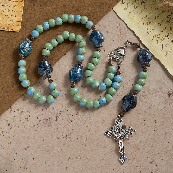 Christianartworkshop Rosenkranz aus Keramik mit Orchideenfisch-Motiv, Herz-Jesu-Verzierungen und kunstvollem Kruzifix - Rosenkranz aus Keramik mit Orchideenfischmotiv - image 0